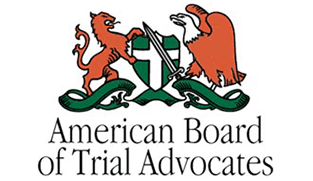 Logo of the American Board of Trial Advocates, featuring a lion and an eagle flanking a shield with a sword, in green, red, and white.