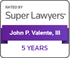 Rated by Super Lawyers badge for John P. Valente III, highlighting 5 years of recognition, featuring a purple and white design.